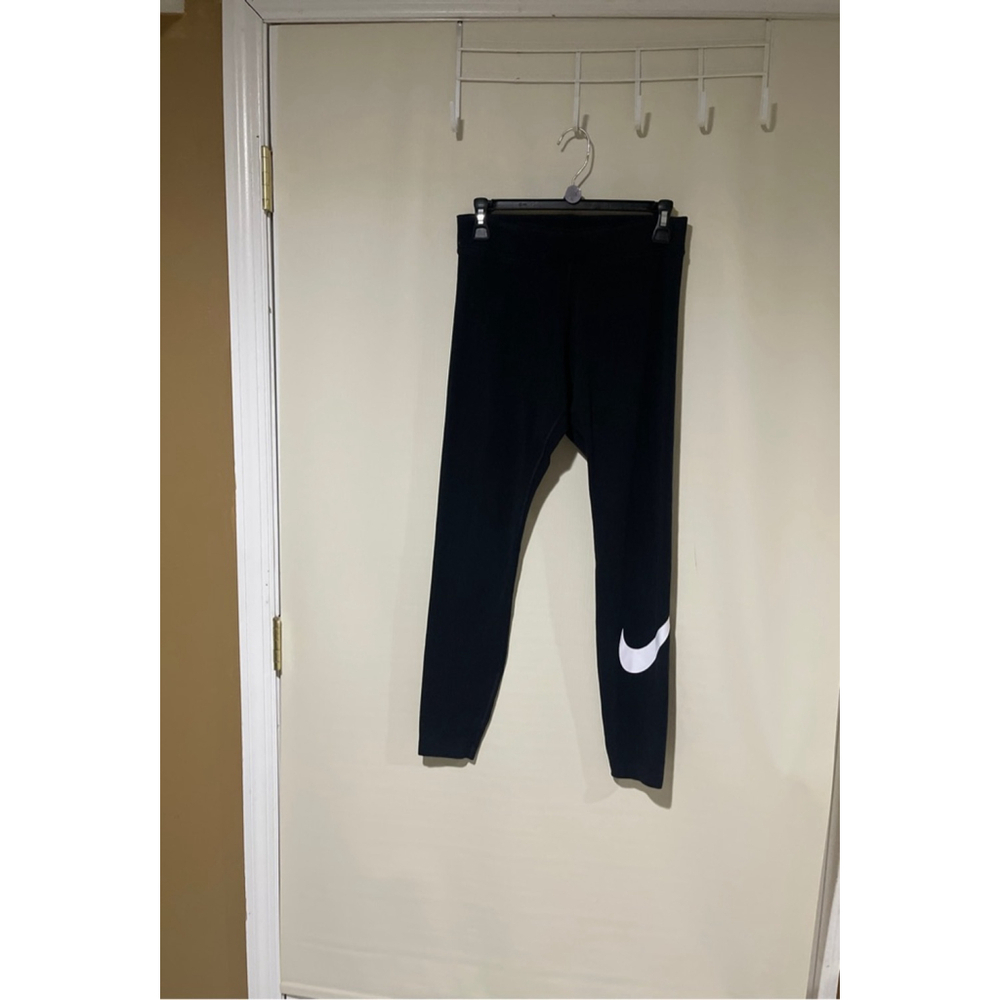 NWOT Women's Nike Black Leggings with White Swoosh Logo, Size M